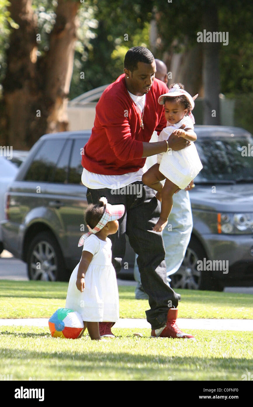 Sean 'P. Diddy' Combs plays with his twin daughters D'Lila Star Combs