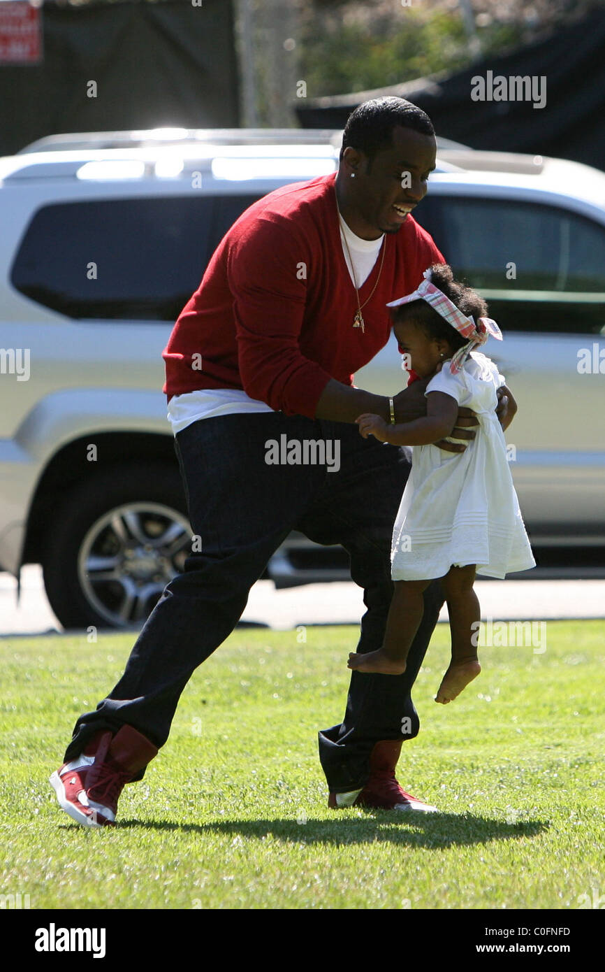 Sean 'P. Diddy' Combs plays with his twin daughters D'Lila Star Combs