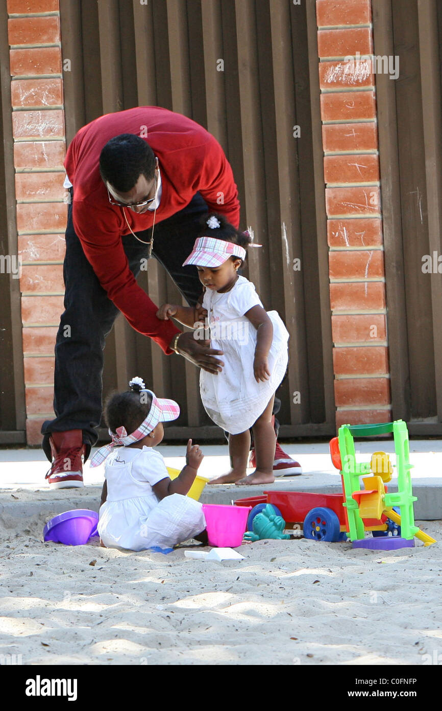 Sean 'P. Diddy' Combs plays with his twin daughters D'Lila Star Combs