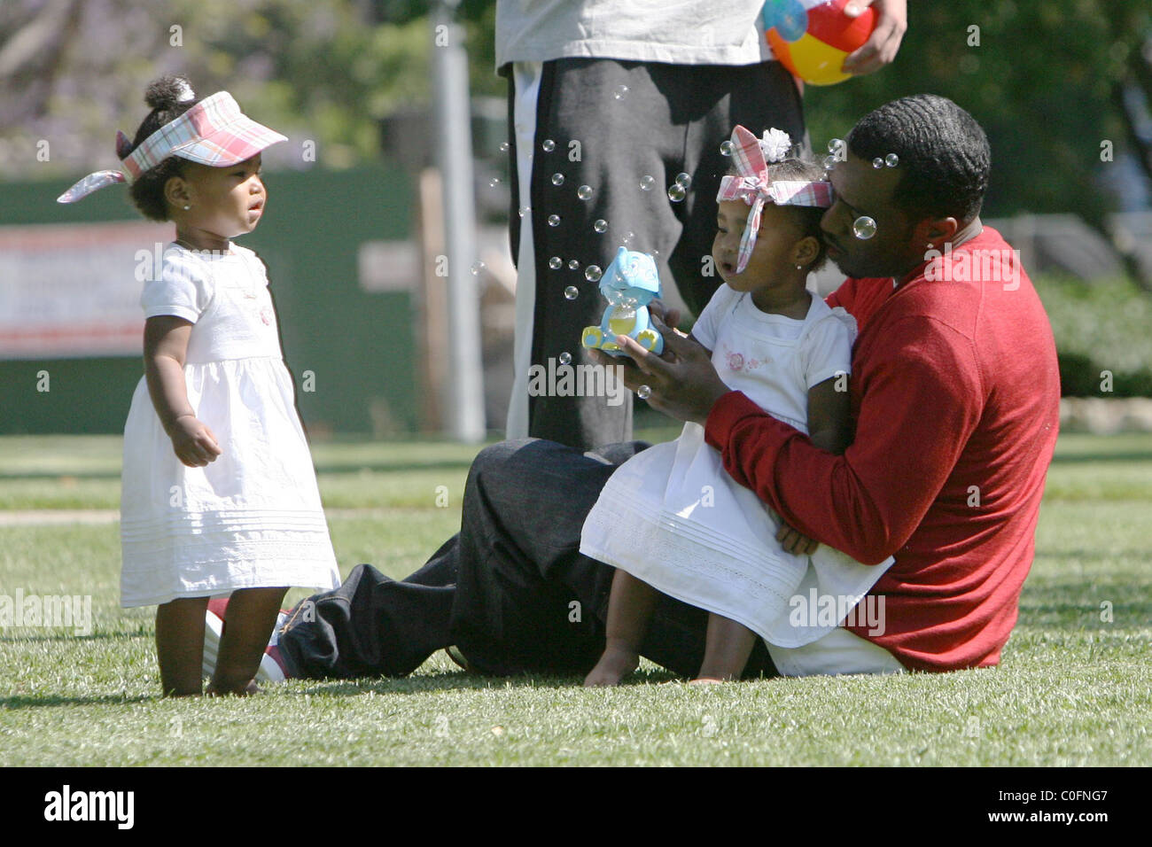 Sean 'P. Diddy' Combs plays with his twin daughters D'Lila Star Combs ...