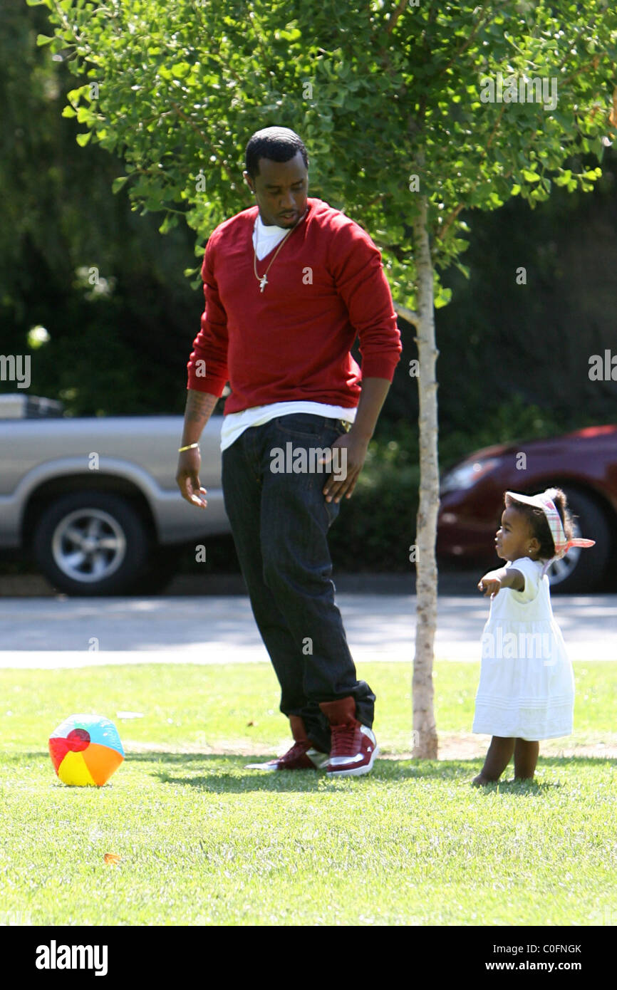 Sean 'P. Diddy' Combs plays with his twin daughters D'Lila Star Combs