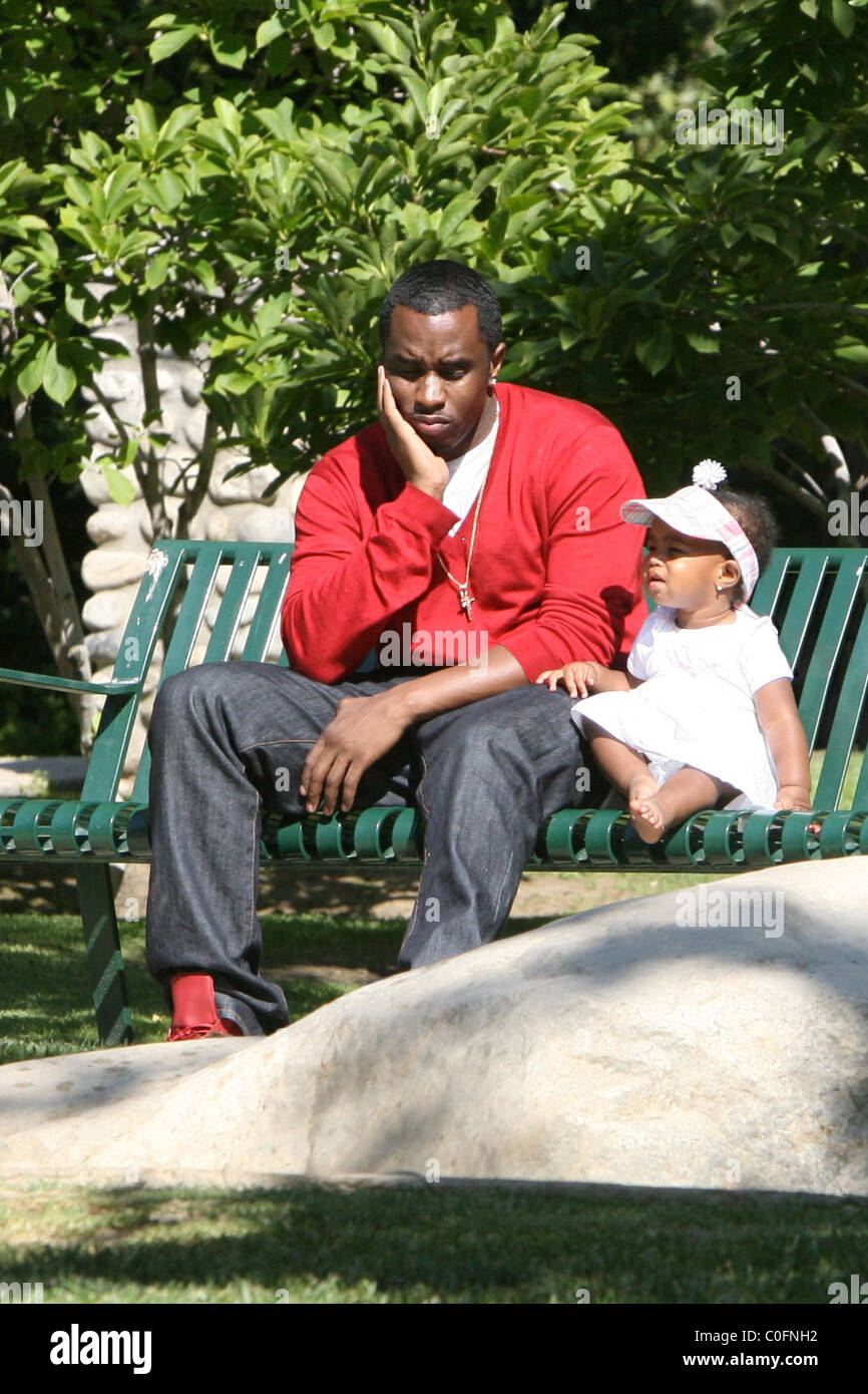 Sean 'P. Diddy' Combs plays with his twin daughters D'Lila Star Combs
