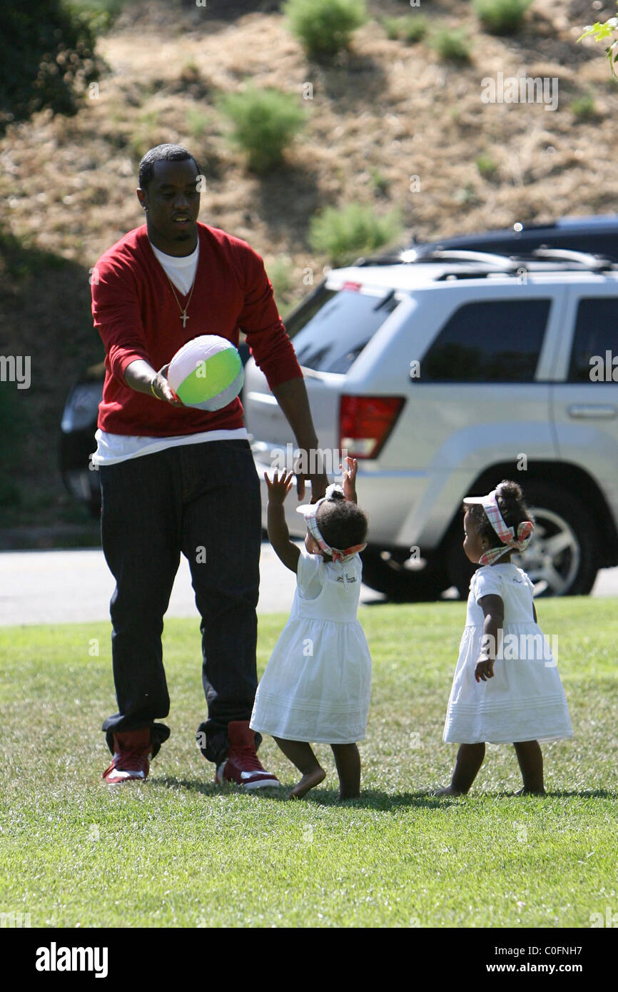 Sean 'P. Diddy' Combs plays with his twin daughters D'Lila Star Combs