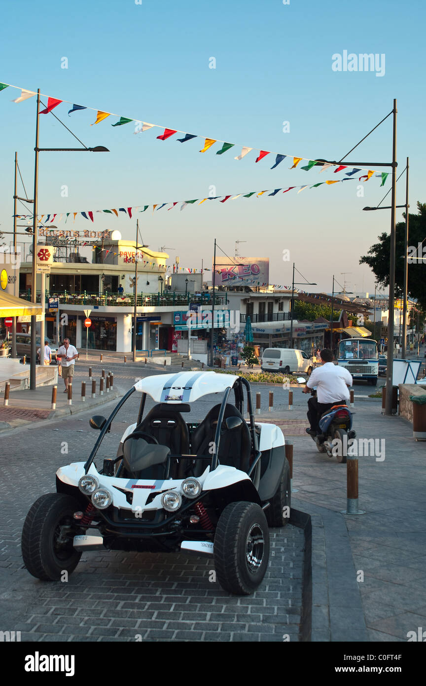 Quad bike parking on street of AyaNapa. Cyprus. Evening time Stock