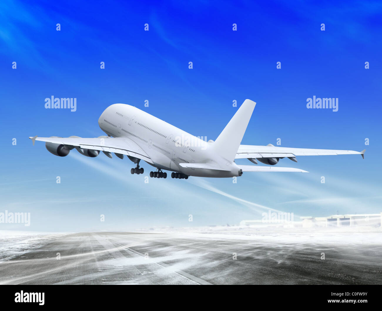 white passenger plane is landing away from airport Stock Photo - Alamy