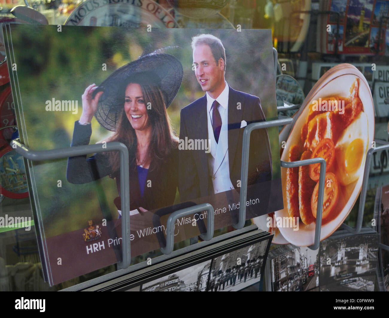 Postcards of HRH Prince William and his fiancée, Miss Catherine Middleton, on sale at a tourist shop in Notting Hill, London. Stock Photo