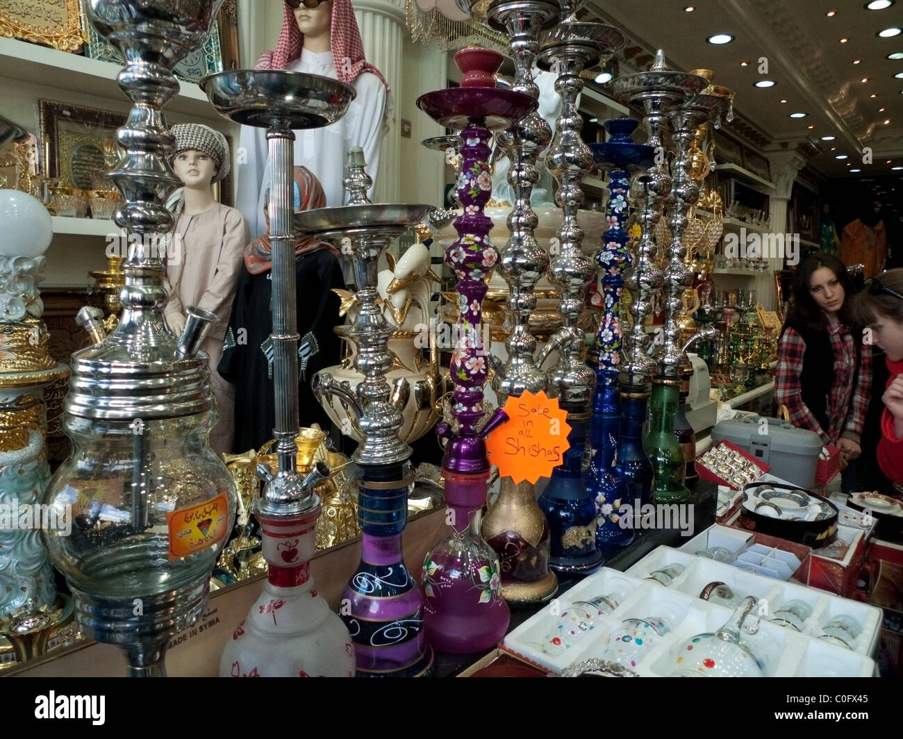 Window display of shisha pipes in a Middle Eastern gift shop on Edgware