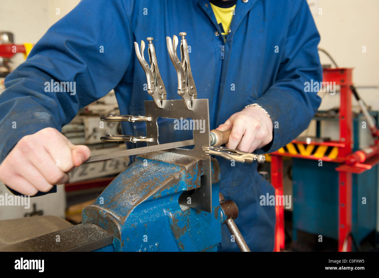 Adults learning metal working skills at a college of further education, Uk Stock Photo