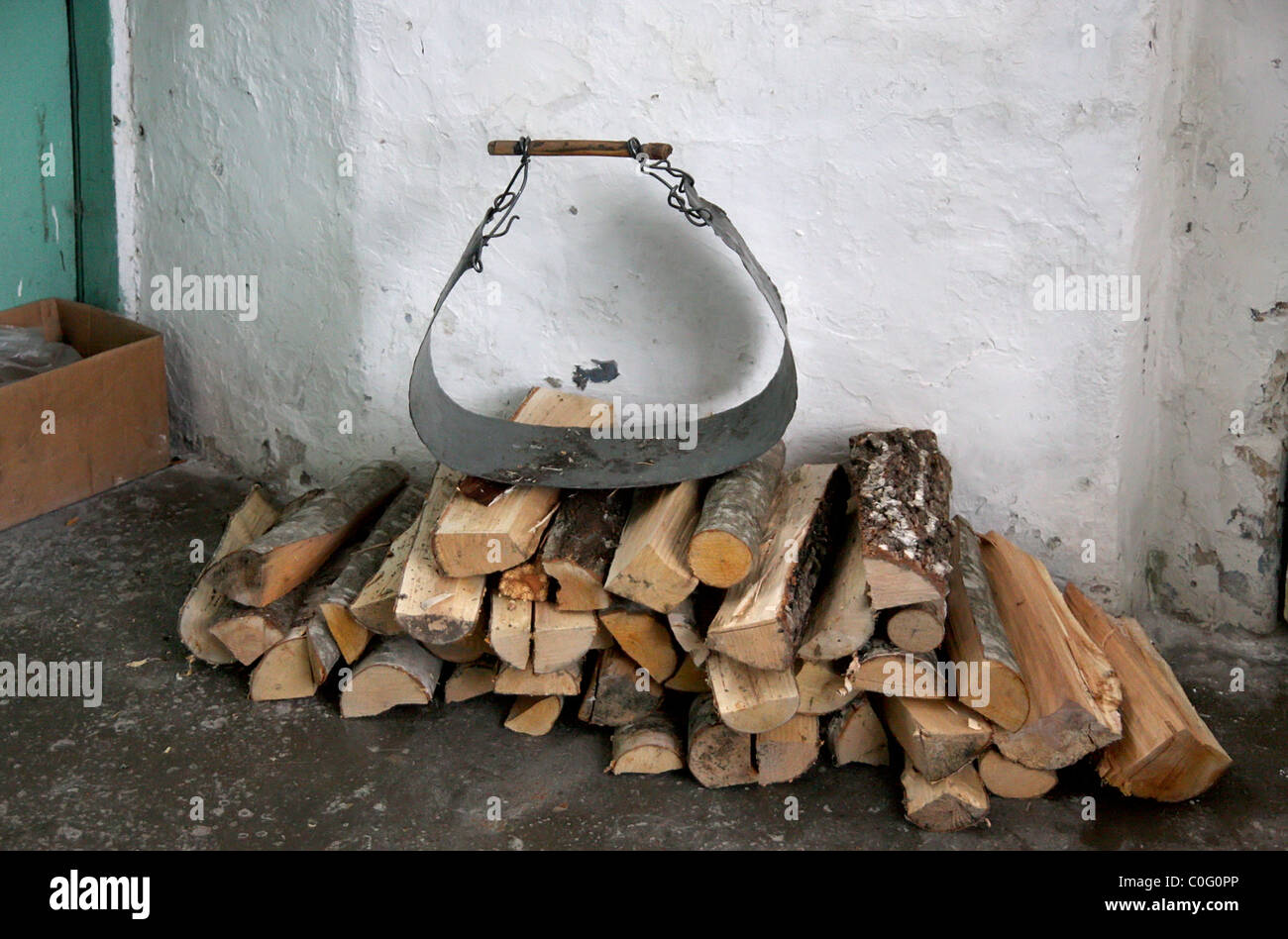 Firewood on the earthen floor Stock Photo