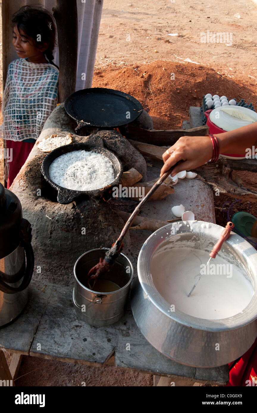 Cooking indian dosa on the street. Andhra Pradesh, India Stock Photo