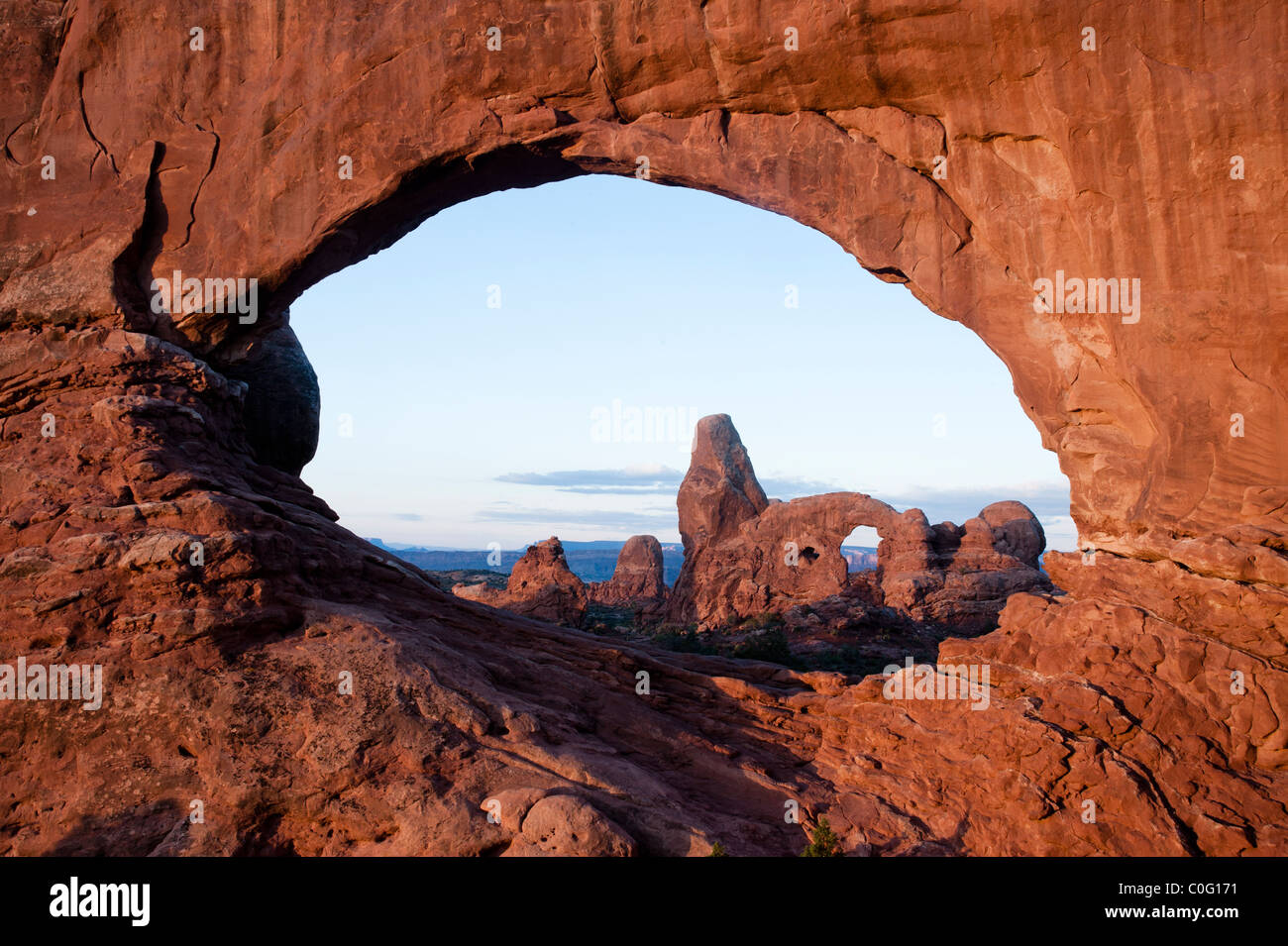 Turrent Arch looking through the North Window Arch at Sunrise Stock Photo