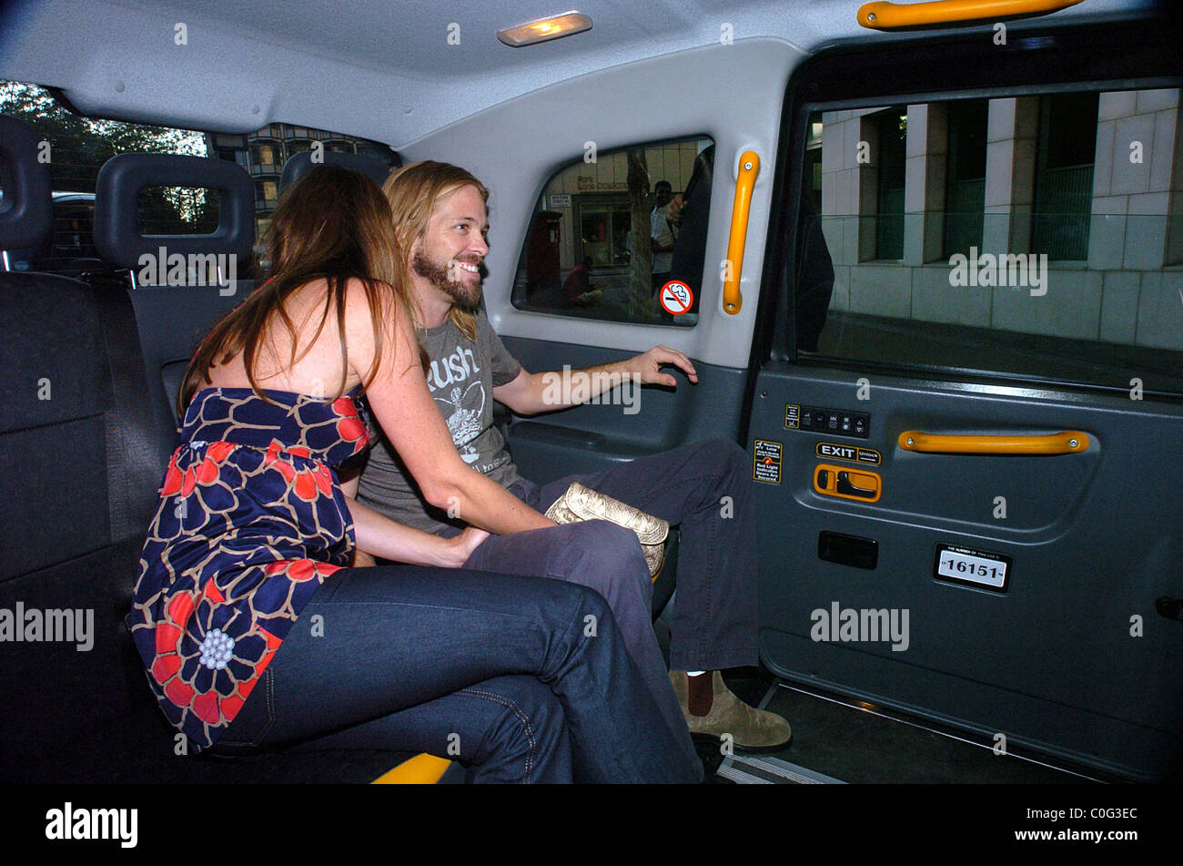 Taylor Hawkins with his wife Alison Outside the Met hotel London