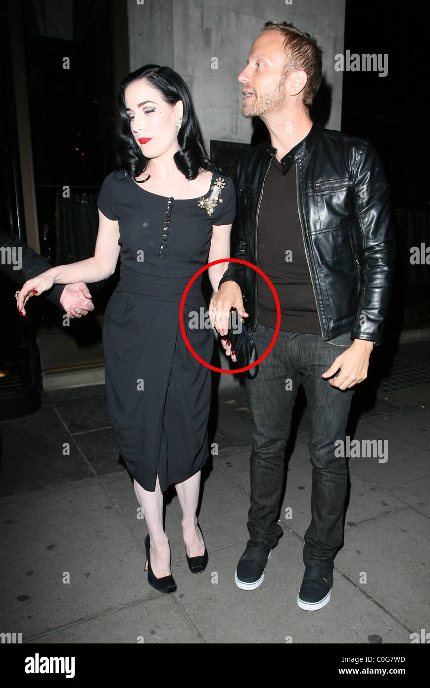 Dita Von Teese and her boyfriend leave the Wolseley restaurant together hand in hand. London, England - 12.06.08 Stock Photo