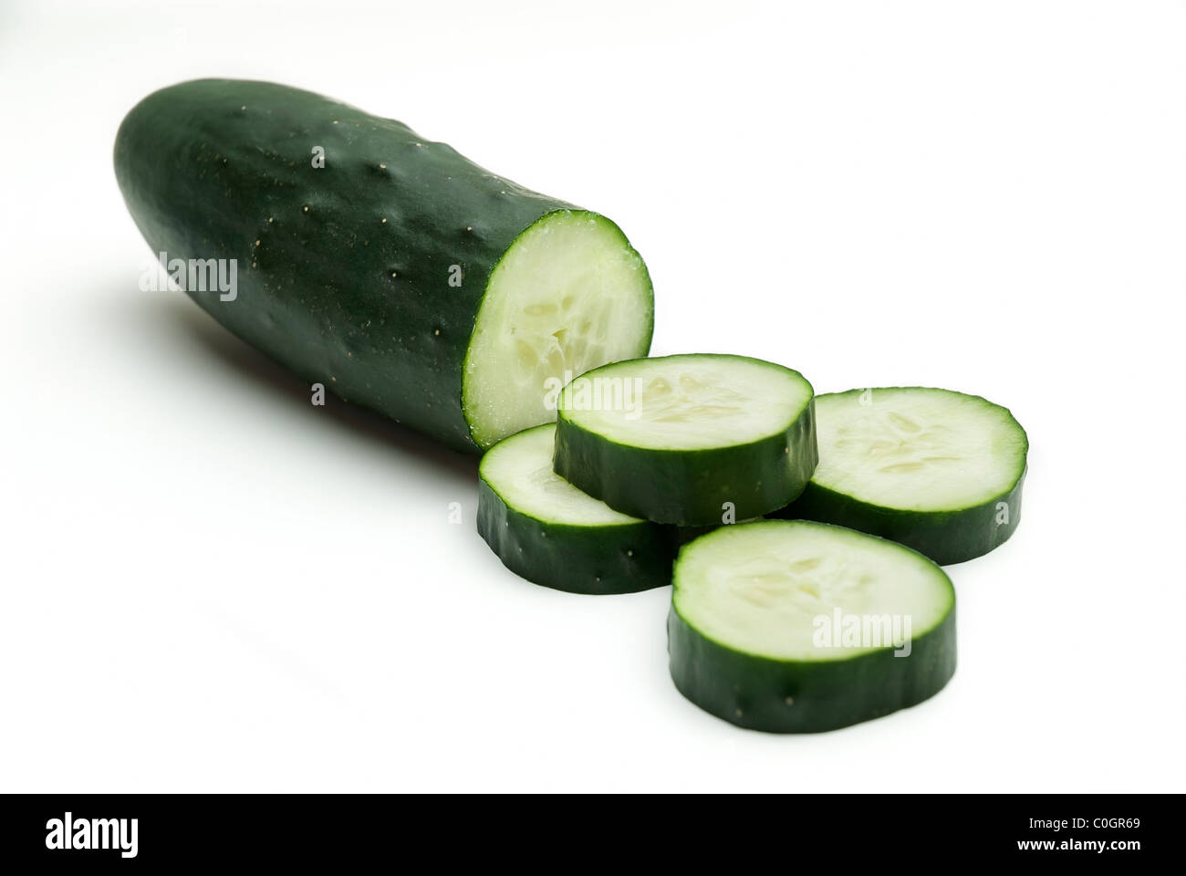 Sliced cucumber on a white background Stock Photo
