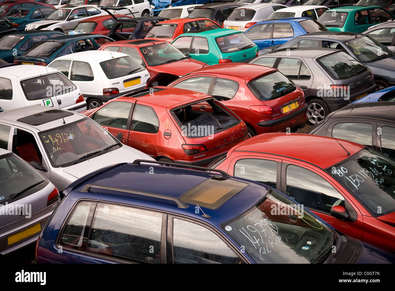 Recovered crashed or stolen vehicles in a car pound, West Sussex, UK Stock Photo Alamy