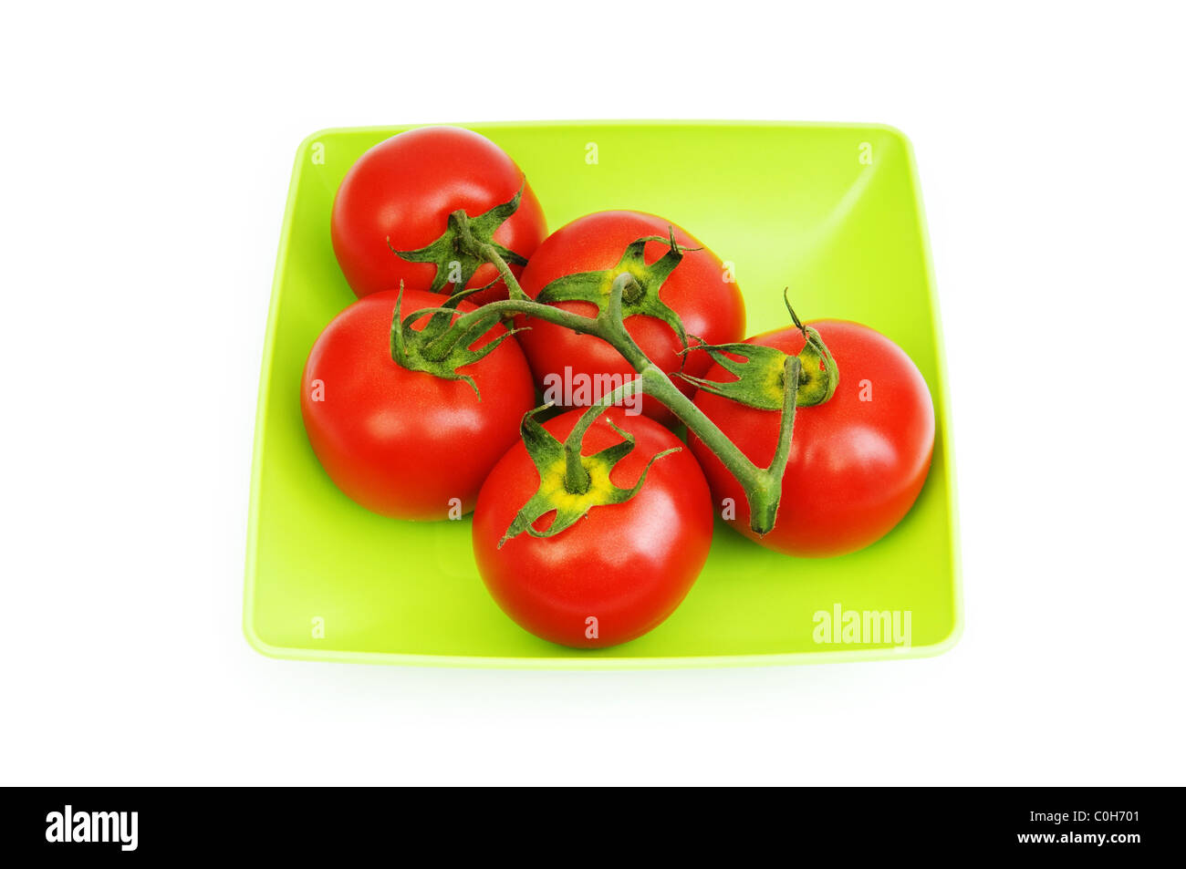 Red tomatoes isolated on the white background Stock Photo - Alamy
