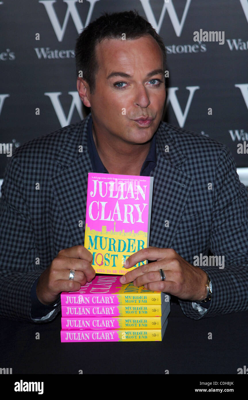 Julian Clary signing copies of his debut novel 'Murder Most Fab' at