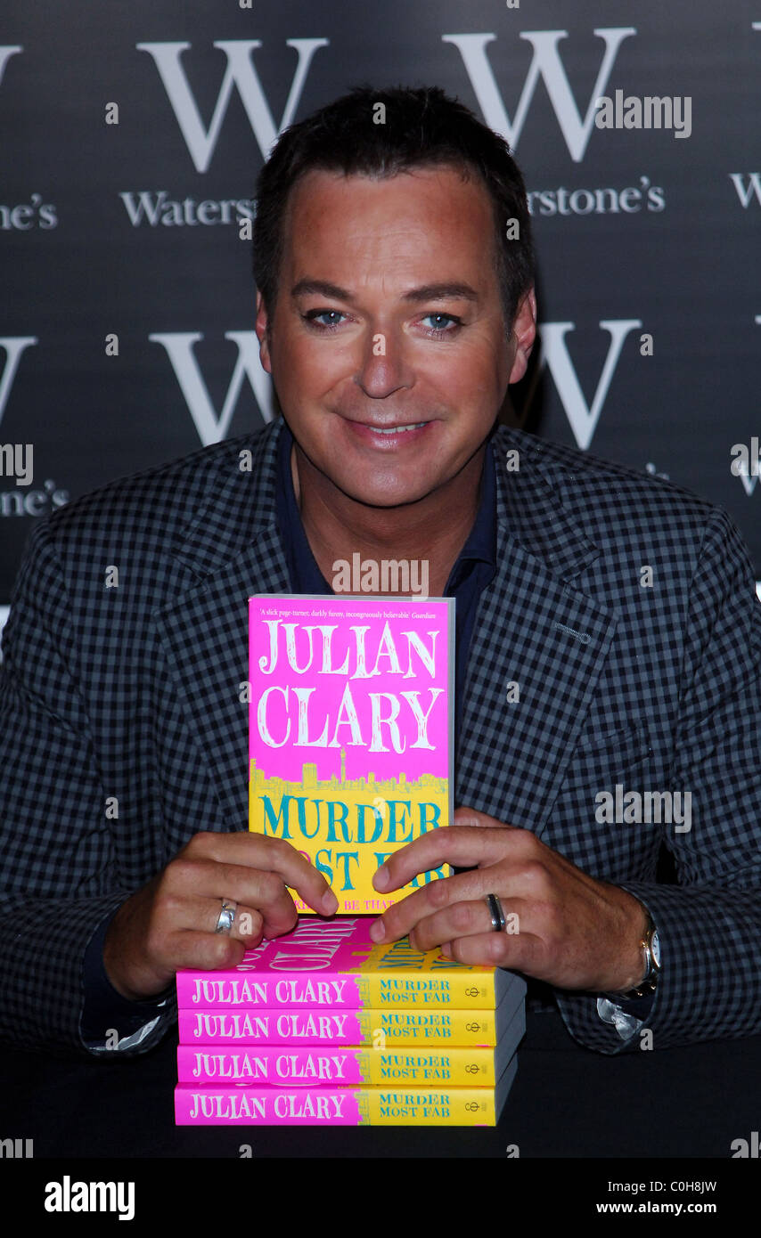 Julian Clary signing copies of his debut novel 'Murder Most Fab' at