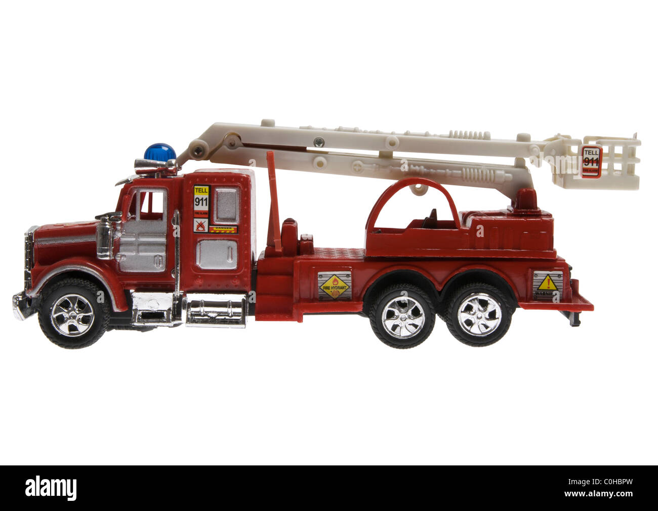 Toy fire ladder engine on white background Stock Photo