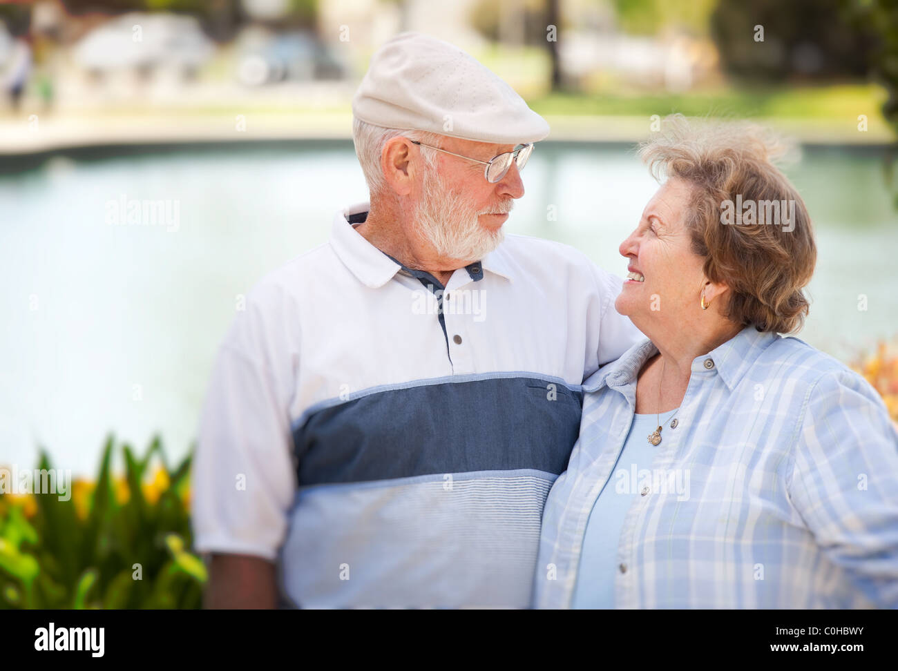 Happy Senior Couple Enjoying Each Other in The Park Stock Photo - Alamy