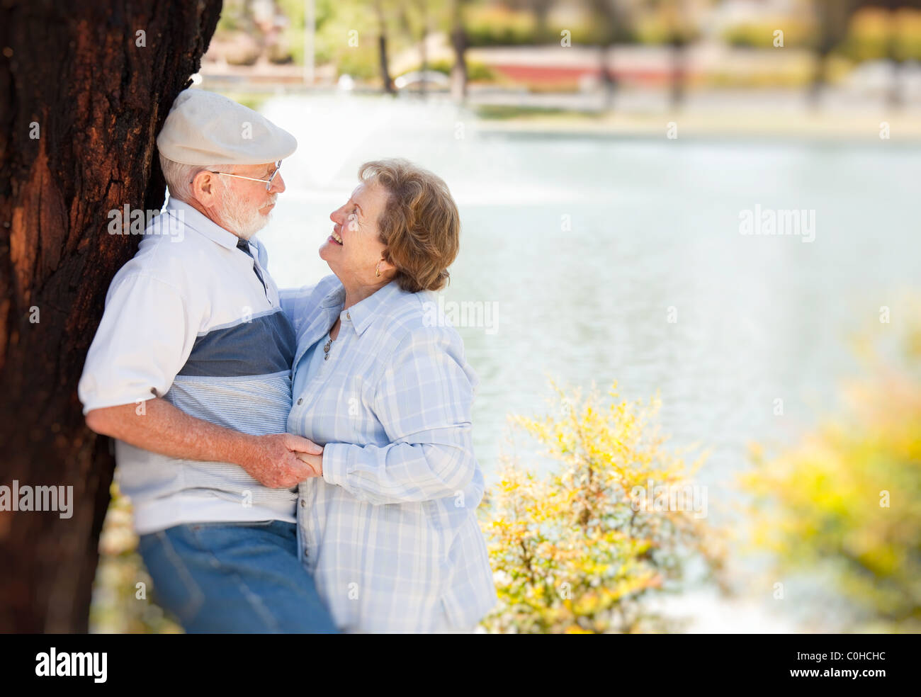 Happy Senior Couple Enjoying Each Other in The Park Stock Photo - Alamy