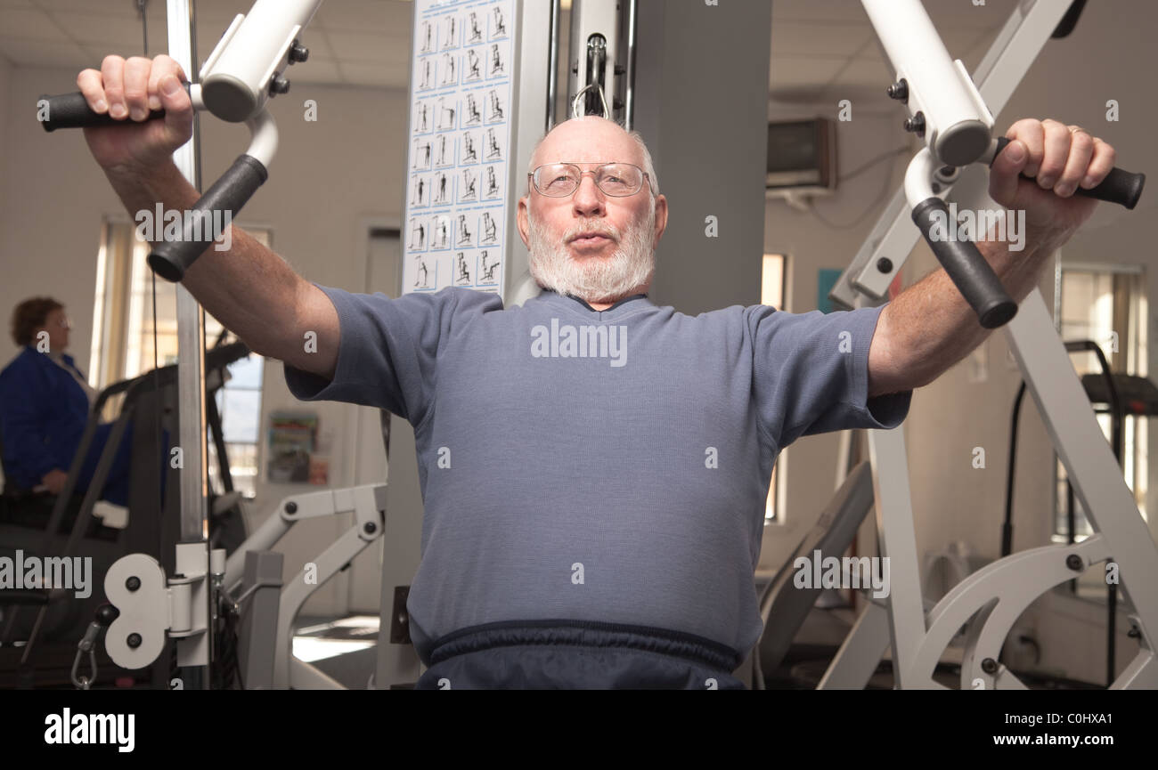 Active Working Man Active Senior Adult Man Working Out in the Gym Stock Photo - Alamy
