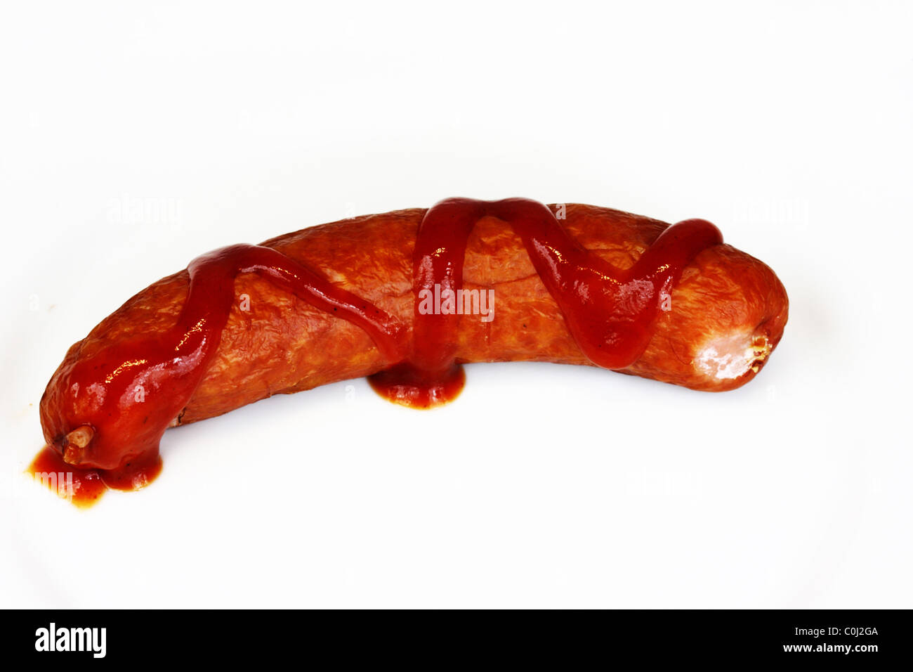 Ham bratwurst with ketchup on white background Stock Photo