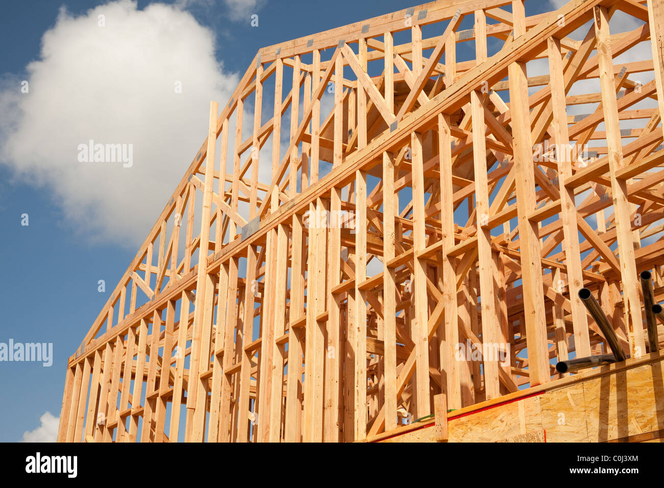 Abstract of New Home Construction Site Framing Stock Photo - Alamy