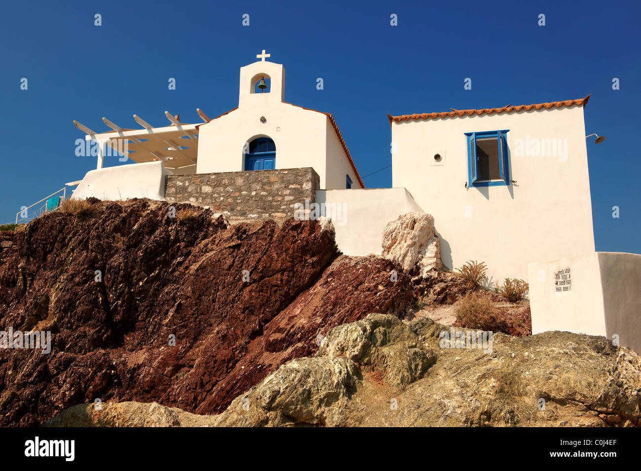 Greek Orthodox chapel at Vlychos, Hydra, Greek Saronic Islands. Stock Photo