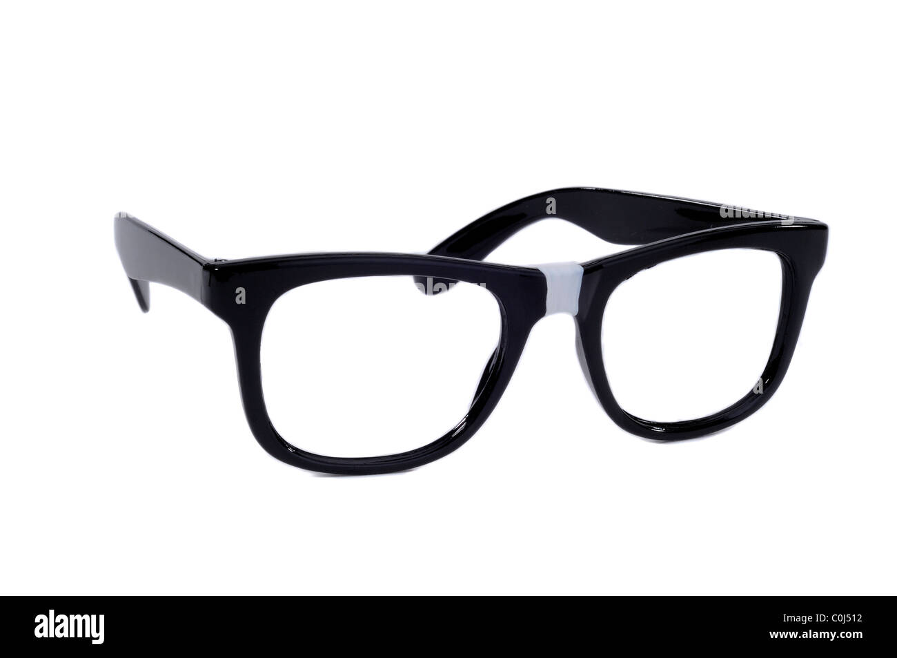 Pair Of Black Sixties Style Glasses With Tape On For A Geek Nerd Style Stock Photo