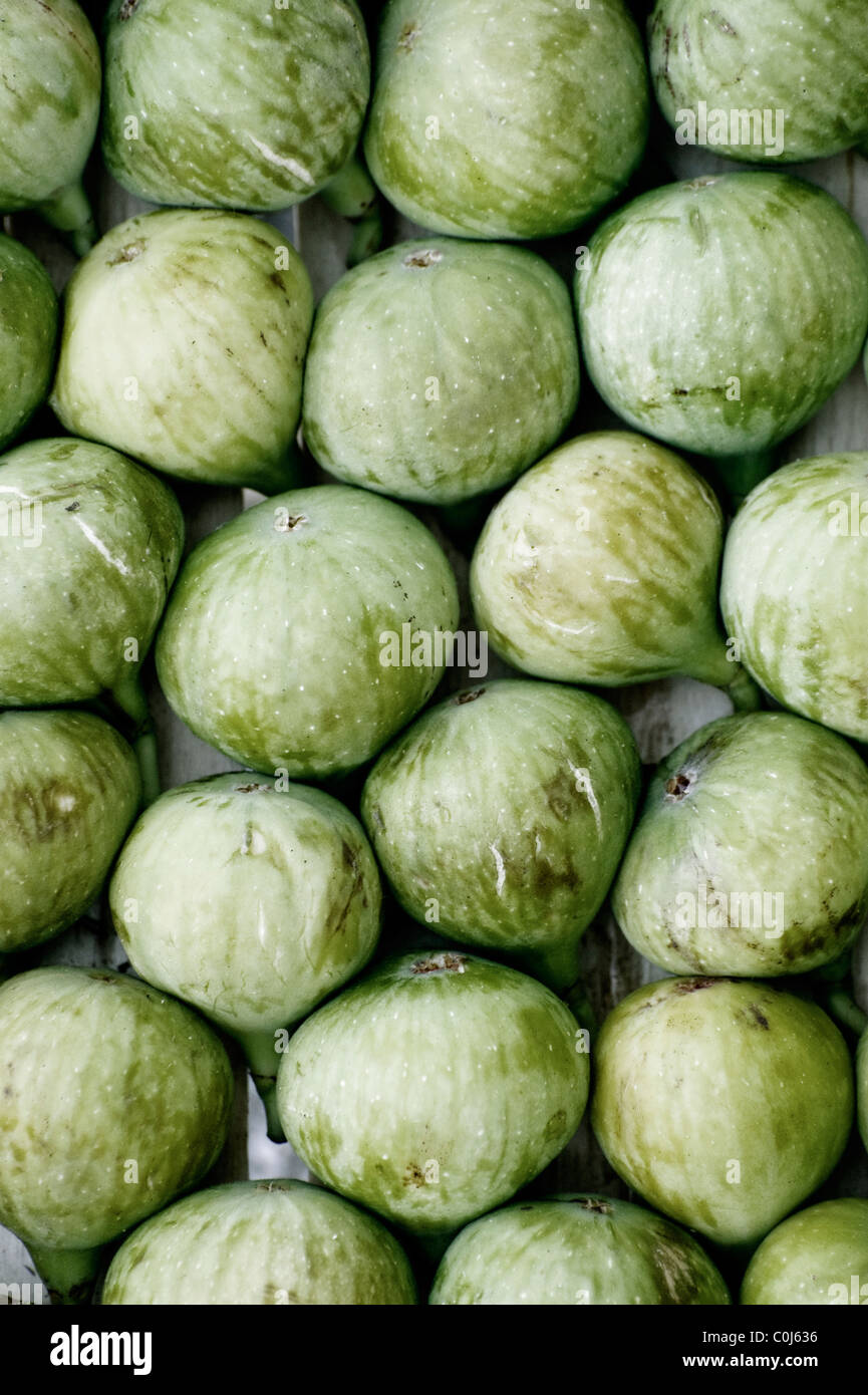 Local grown green figs for sale at a street vegetable and fruit stall
