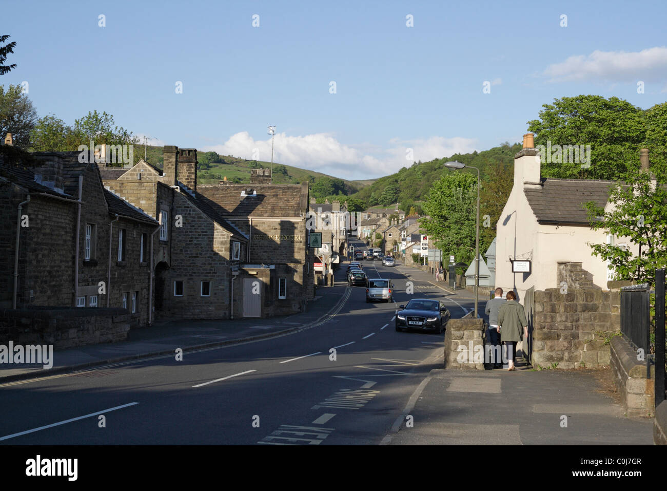 The main Road through Hathersage village in Derbyshire England. Peak district national park Stock Photo