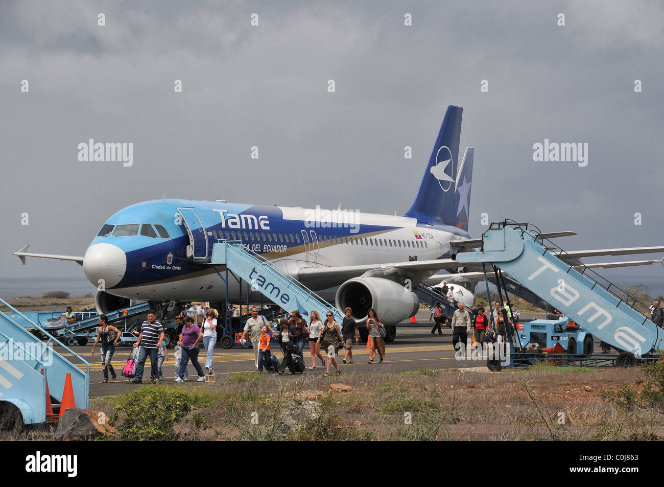 passengers leaving plane in Baltra airport Galapagos islands Ecuador Stock Photo