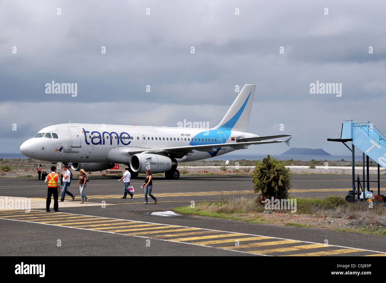 passengers leaving plane in Baltra airport Galapagos islands Ecuador Stock Photo