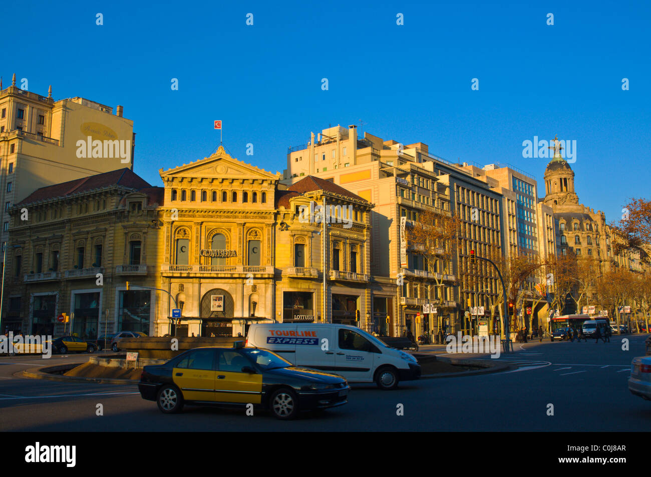 Traffic in front of Teatro de la Comedia theatre on Gran Via de les Corts Catalanes street Barcelona Catalunya Spain Europe Stock Photo