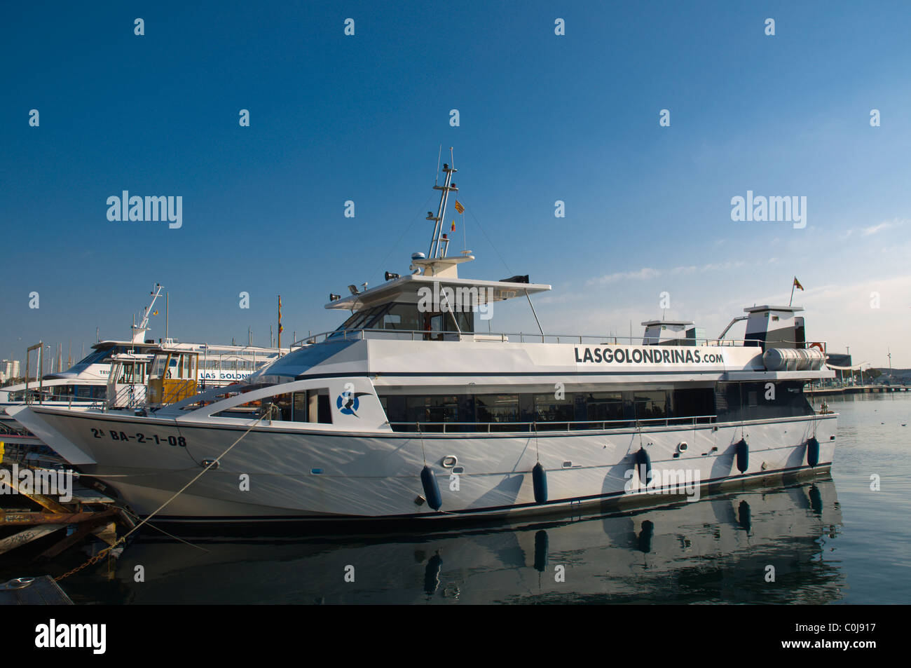 Las Golondrinas sightseeing boat at Port Vell central Barcelona Catalunya Spain Europe Stock Photo