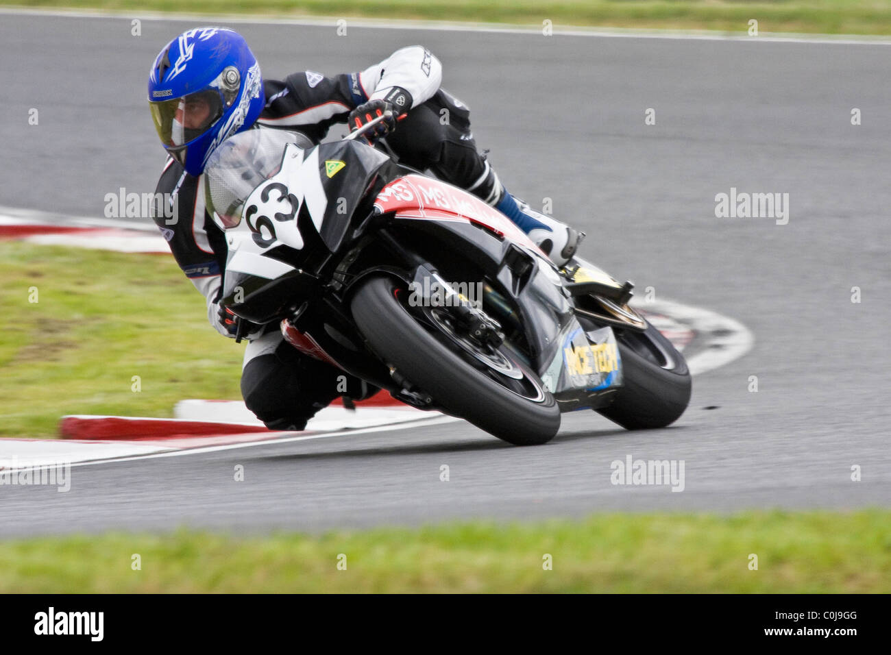 Eso Raceway Motorcycle A motorcycle rider leaning into a turn on Eastern Creek Raceway Stock ...