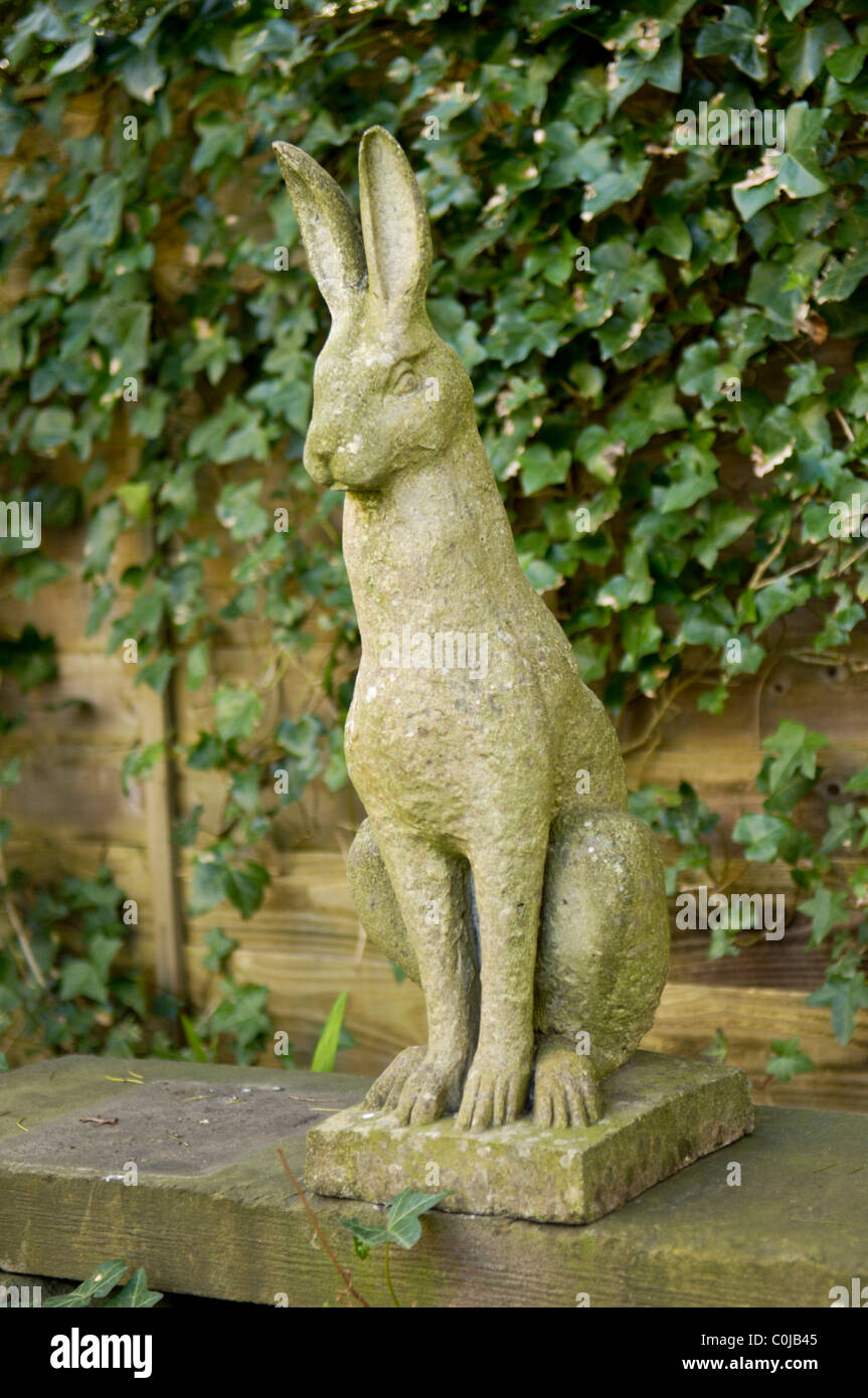 Stone garden ornament of a hare, jackrabbit or rabbit Stock Photo - Alamy
