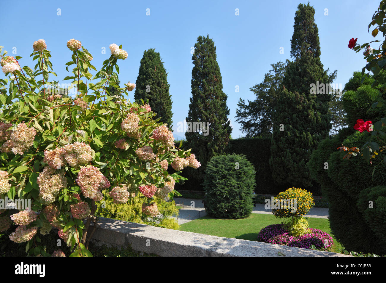Northern Italy, Lake Maggiore. A masterpiece of landscape art. Bright flower beds in the park on the island of Isola Bella. Stock Photo