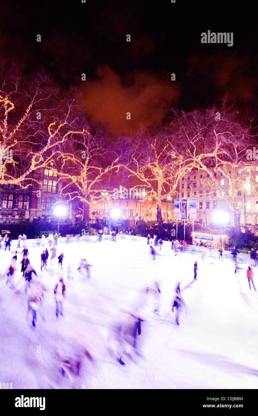 Ice skating outside the Natural History Museum in London, UK Stock
