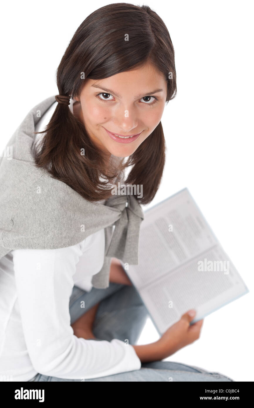 Portrait of teenager reading book on white background Stock Photo - Alamy