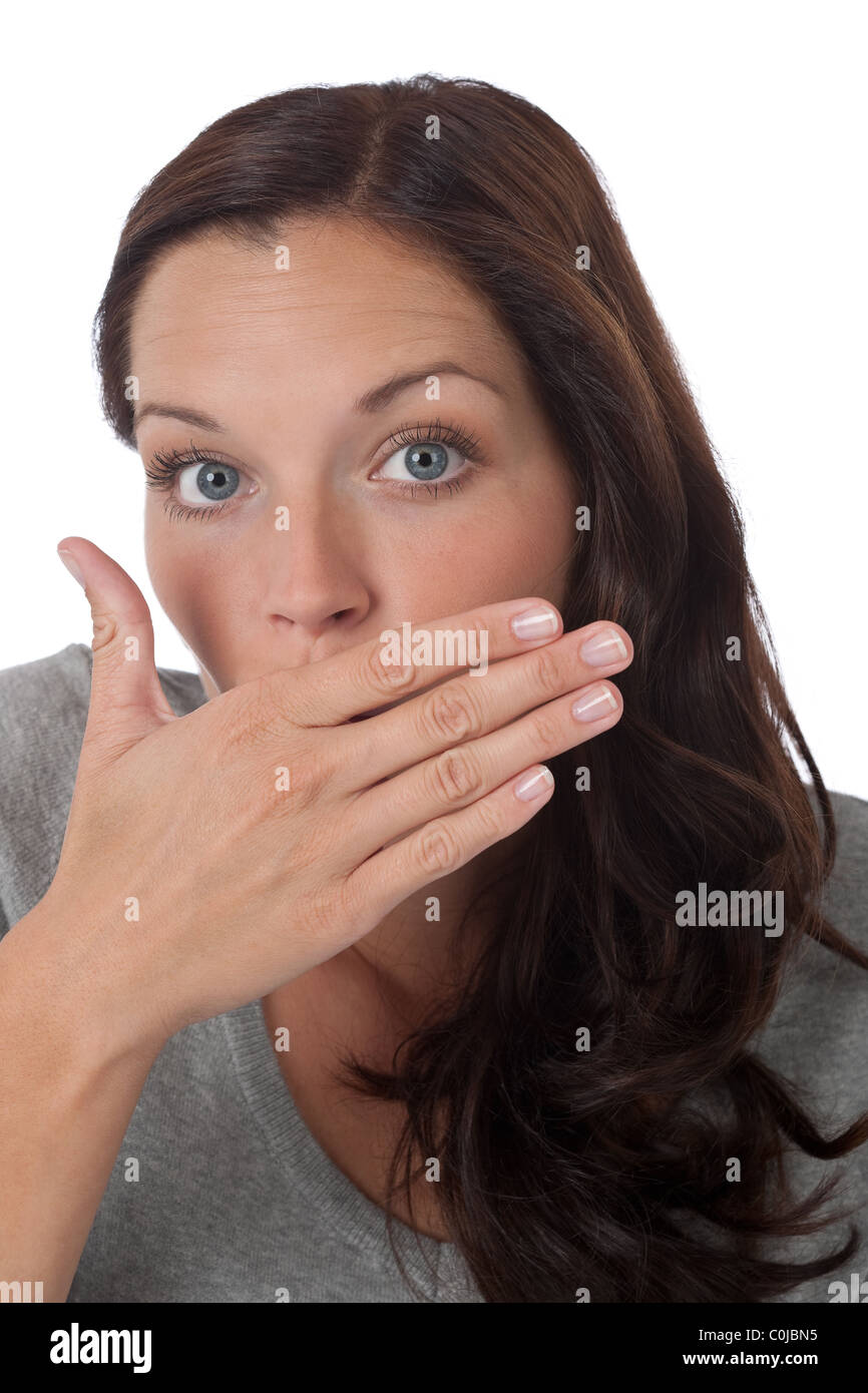 Surprised young woman on white background Stock Photo - Alamy