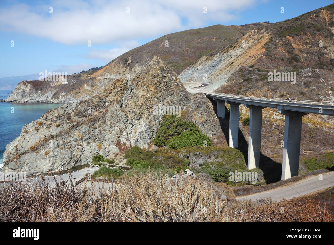 The magnificent bridge-viaduct on coastal highway of Pacific ocean Stock Photo