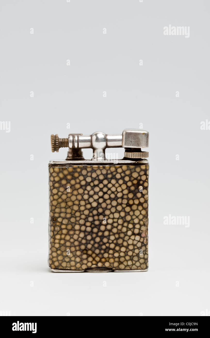 Shagreen (shark skin) cigarette lighter made by Dunhill (Parker Beacon). 1920s Stock Photo