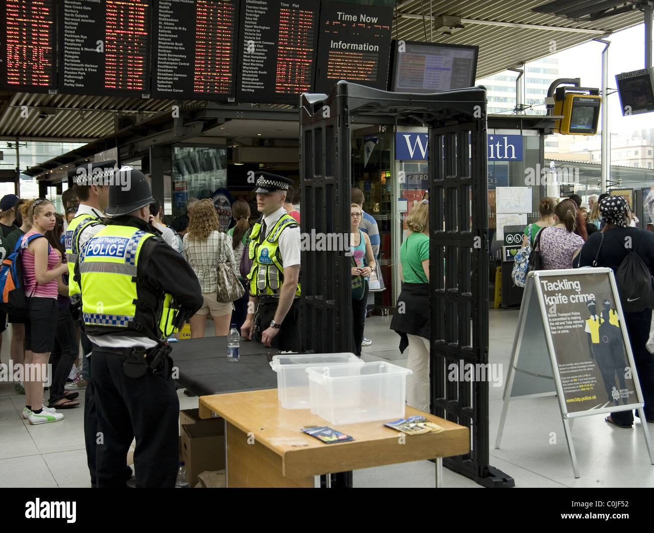 Metal detectors in use at croydon station hires stock photography and