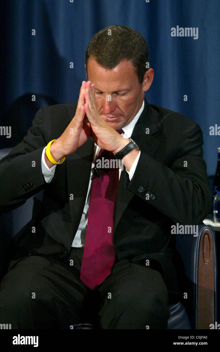 Lance Armstrong speaking at the press conference for his foundation