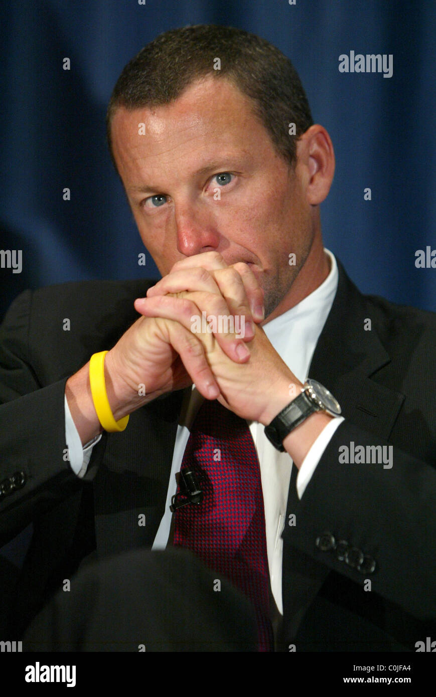 Lance Armstrong speaking at the press conference for his foundation