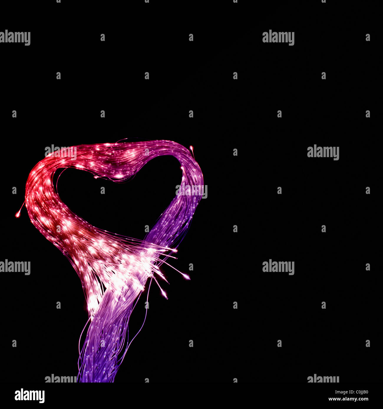 Heart shaped fiber optic cables in the light sensory room. Stock Photo