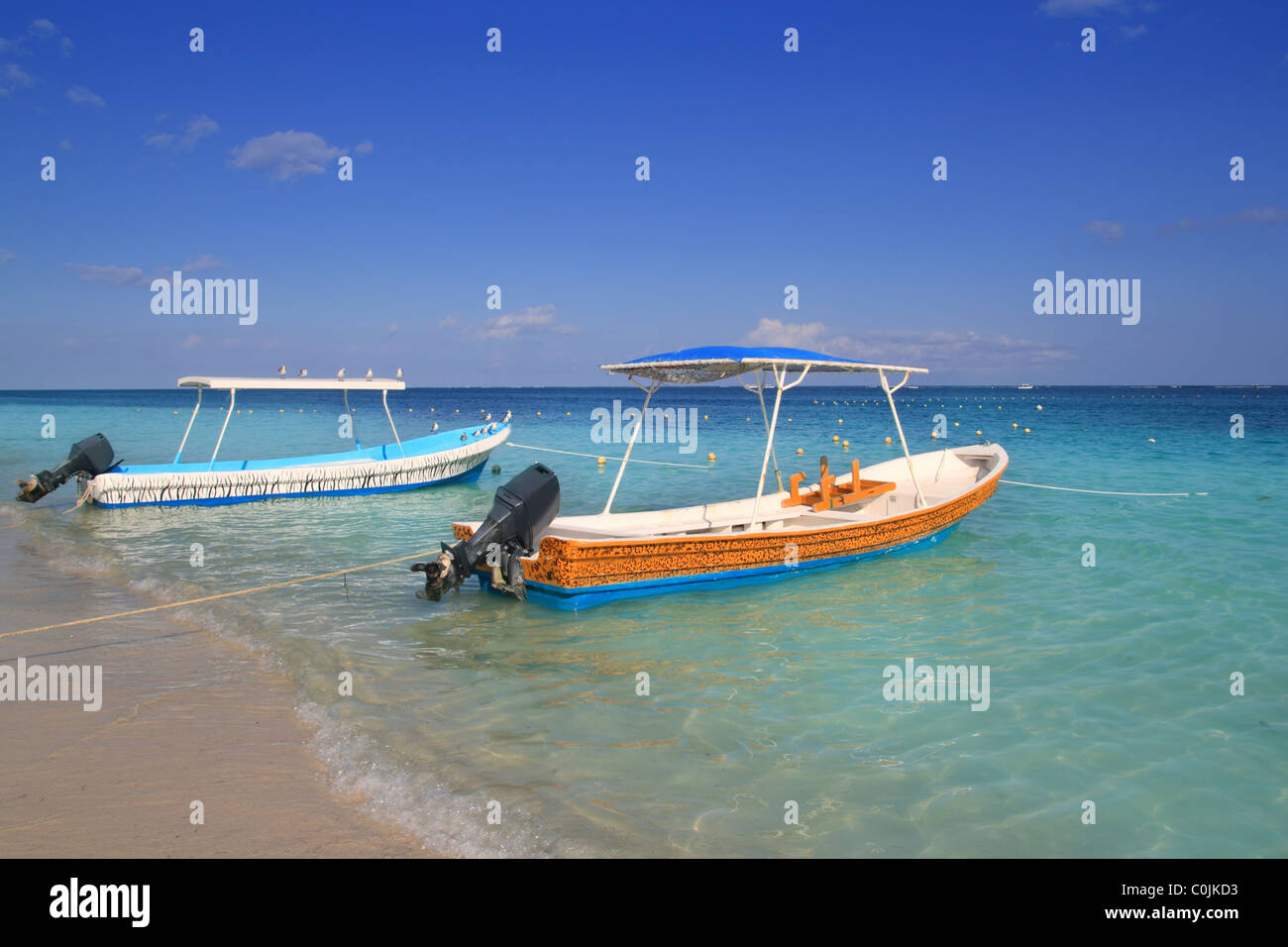 boats in caribbean beach turquoise sea water Stock Photo Alamy