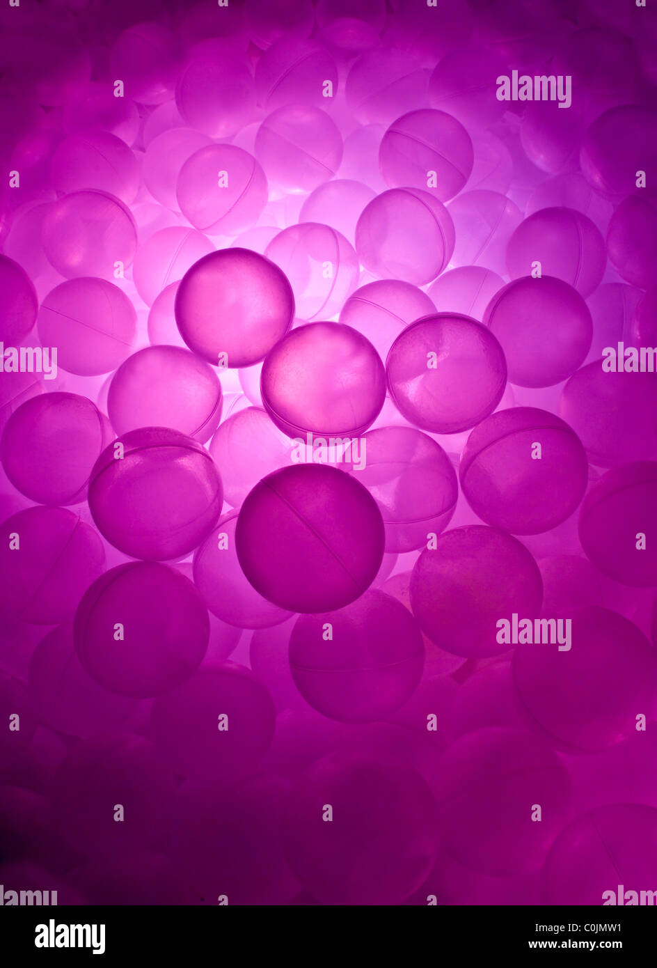 Pink ball pool in the light sensory room. Stock Photo